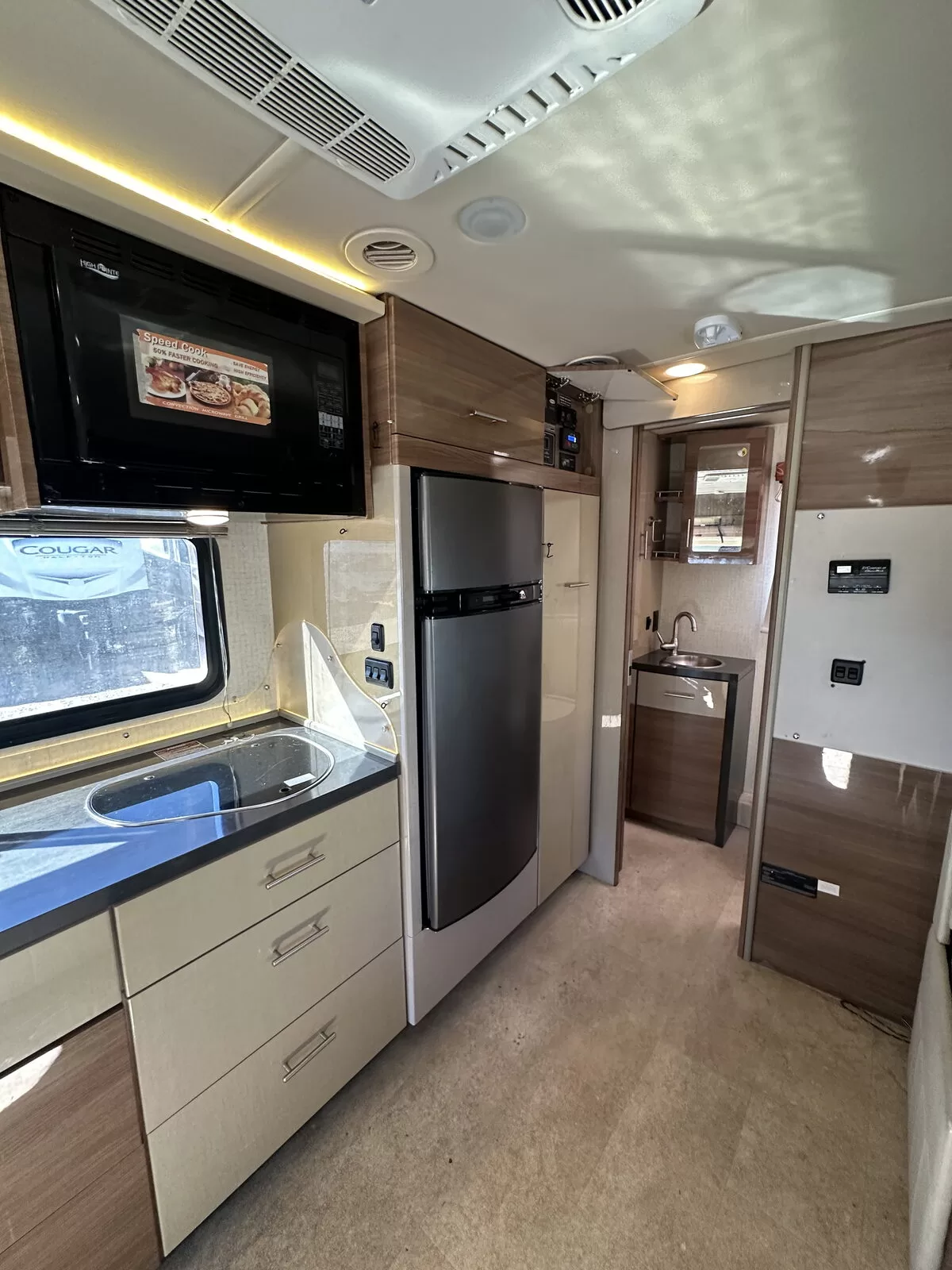 2015 Winnebago 24M Class B+ storage and compartments at All Star Rv in Littleton, CO