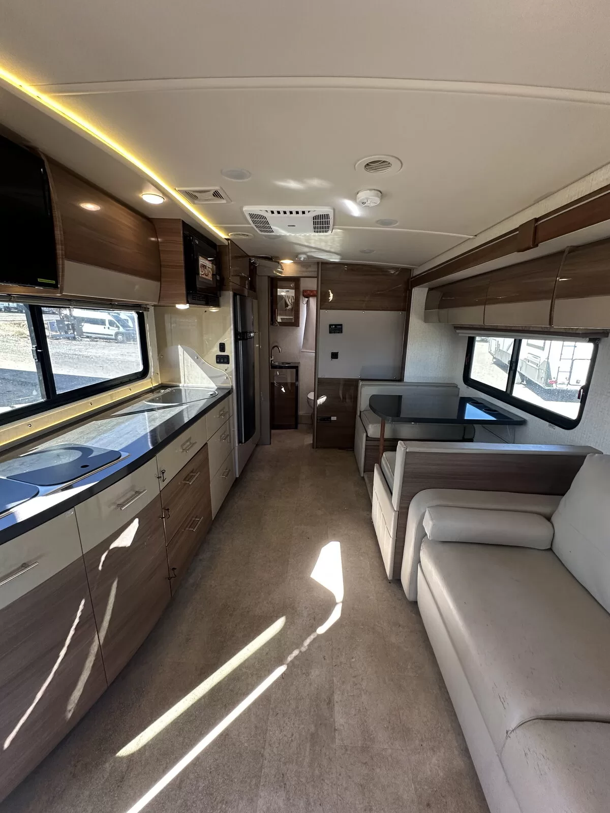 2015 Winnebago 24M Class B+ bathroom and shower at All Star Rv in Littleton, CO
